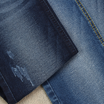 Denimgewebe mit der Ausdehnung passend für die Frauenjeans, die bei 9,9 Unze in der dunkelblauen Farbe machen