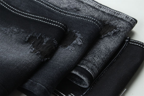 Guter Preis 11.5oz Denim Stoff Steif 56%C 44%P Schwarz Und Schwarz Rückseite Für Marken Stil Jeans Freund Stil Weich Handfeeling Online