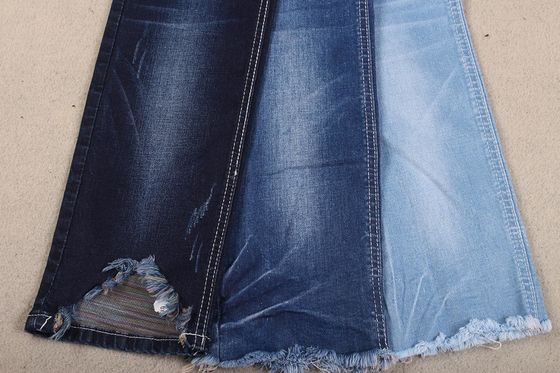 Guter Preis bunte Rückseitenbaumwollvorgespinstausdehnungs-Denimgewebe für Damenjeans und -Hotpants Online