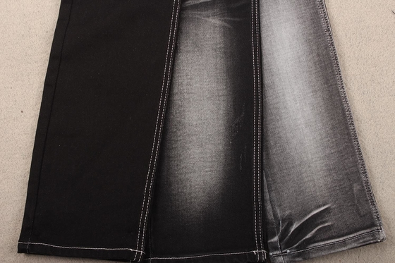 Blume, welche die Farbschwefel-Schwarze Hand glaubt weichem Denim-Gewebe druckt