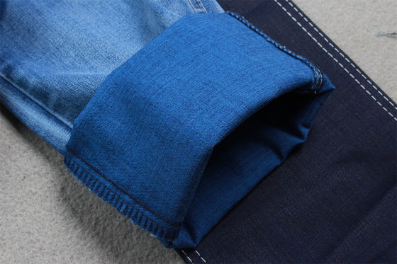 Guter Preis 9-10 oz Tencel Jeans Stoff für Damen Jeans Hoch dehnen für hochwertige Marke Jeans aus Guangdong China Fabrik Online