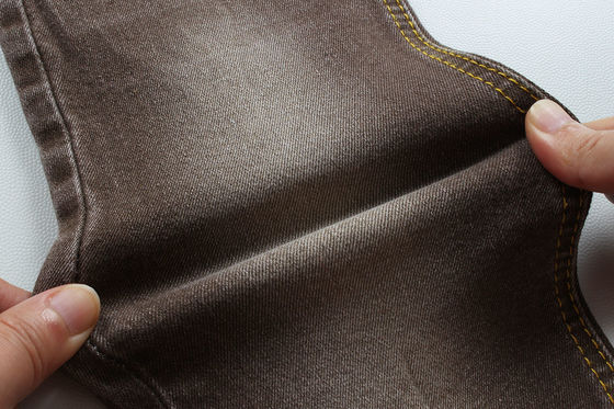Guter Preis Superbraun Stretch Denim Stoff für Frauen Mann Jeans Low Stretch Wettbewerbspreis aus China Foshan City Online