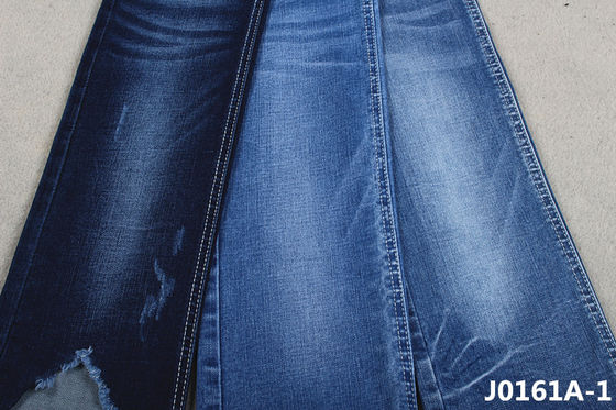 Guter Preis Das Stretchable Sanforisieren spinnen 10 Unze-Denim-Gewebe für Frühlings-Winter-dünne Frauen-Jeans vor Online