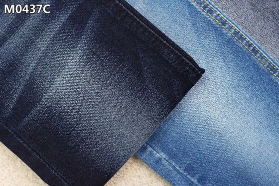 Guter Preis Indigo-Blau-Baumwoll-Polyester Spandex-Denim-Gewebe mit geringfügigem Vorgespinst-Frauen-Jeans-Material Online
